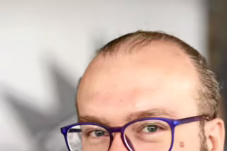 Роман Мінін