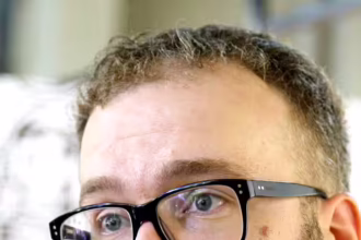 Роман Мінін