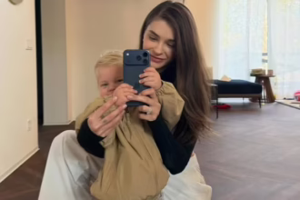 Катерина Остапчук з сином Тимофієм на руках фото
